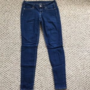 Mid rise dark wash jeans